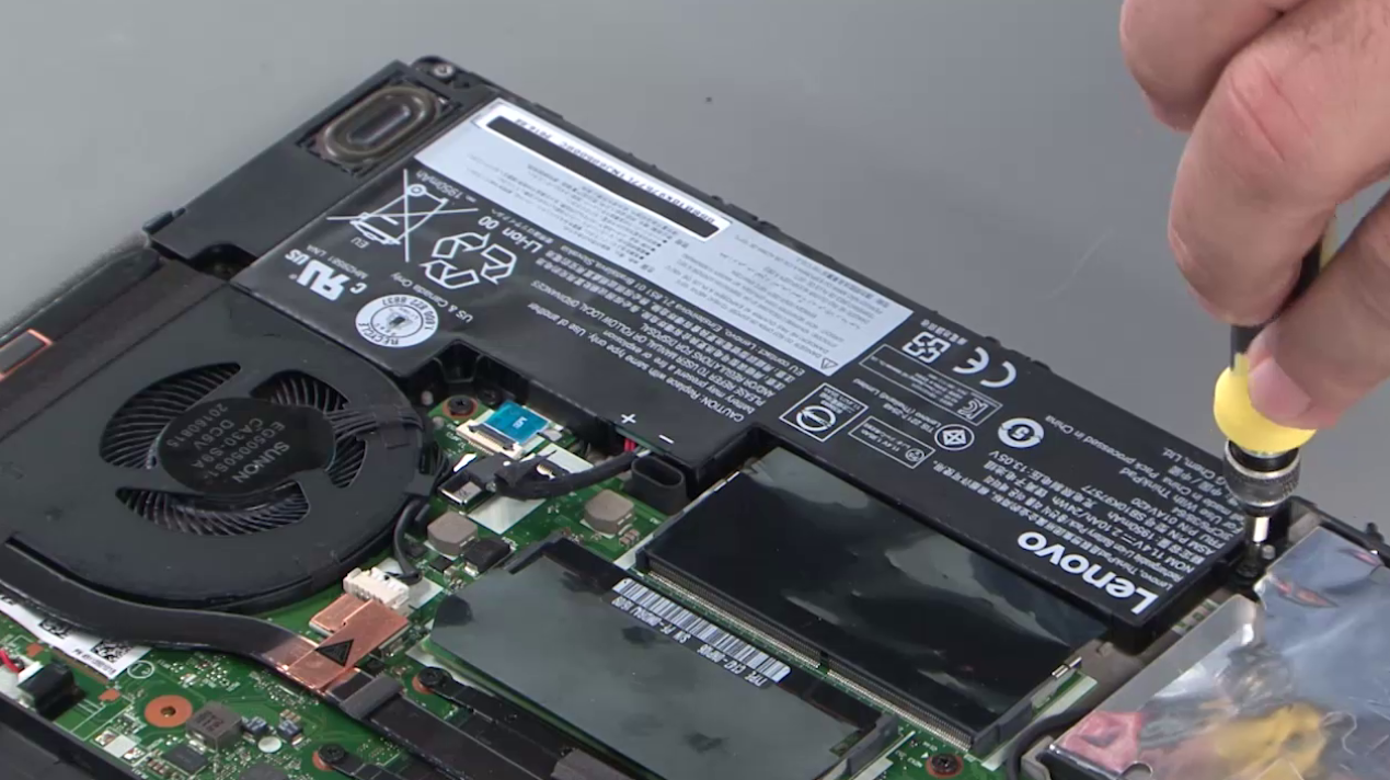 Remove two screws securing internal T480 battery